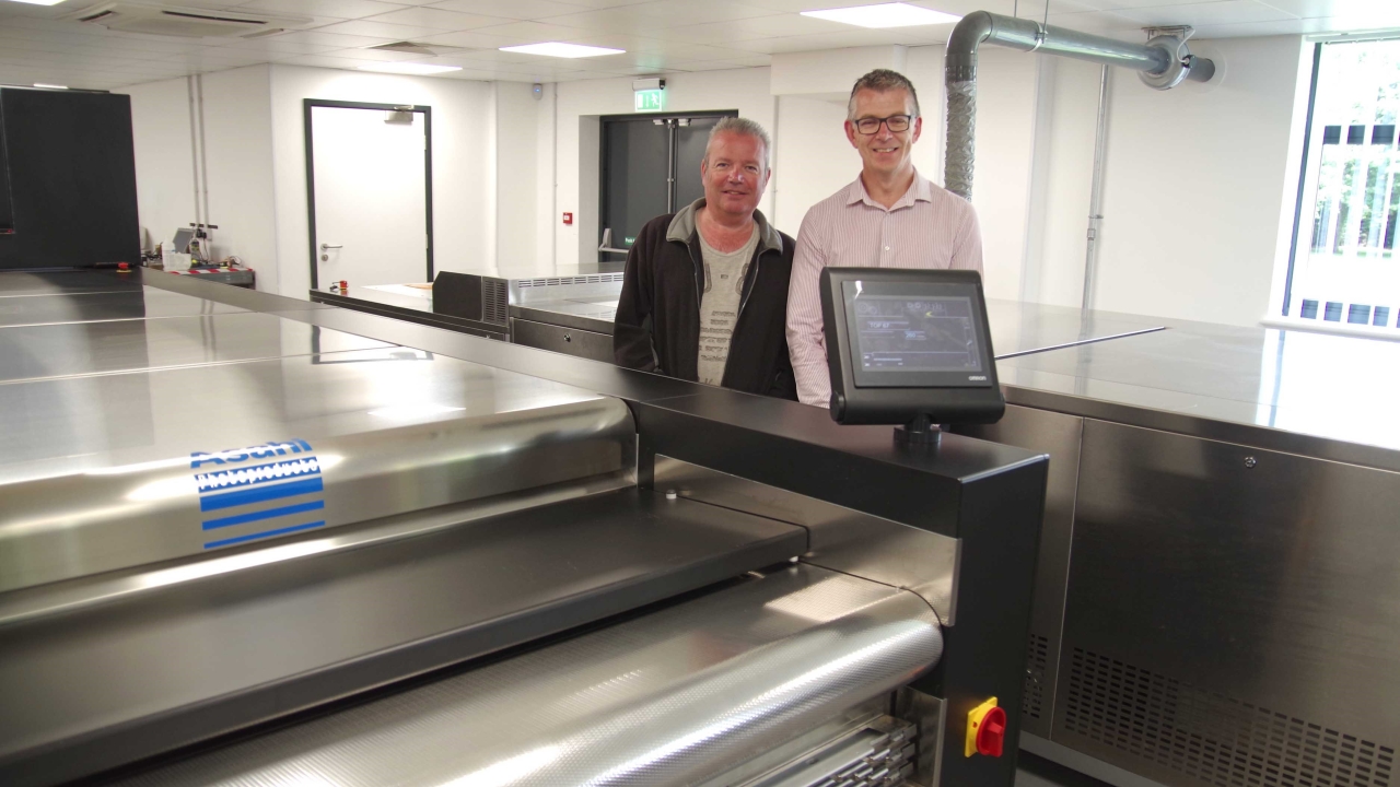 Mark Gration (left), YRG group managing director, and Paul Chant (right), Asahi Photoproducts UK branch manager Mark Gration (left), YRG group managing director, and Paul Chant (right), Asahi Photoproducts UK branch manager