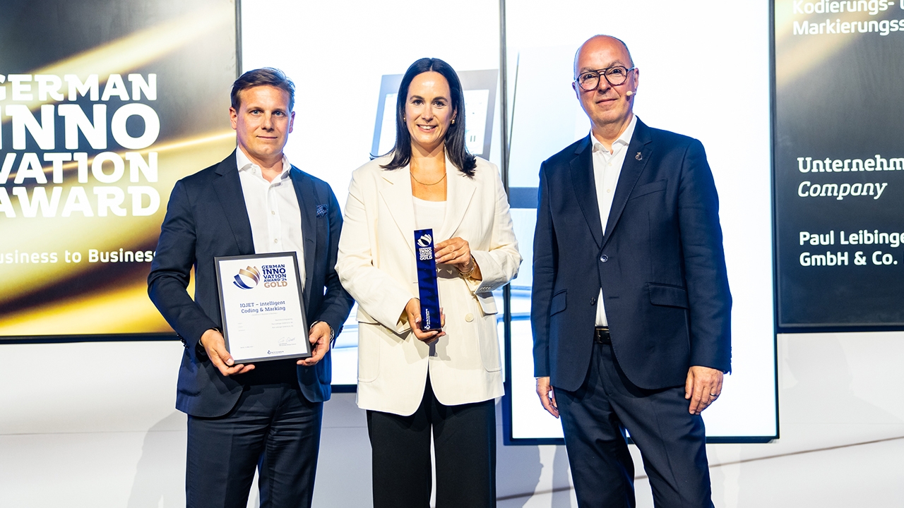 Christina Leibinger, CEO at Leibinger with Jan van het Reve, COO, accepting the German Innovation Award in Berlin.