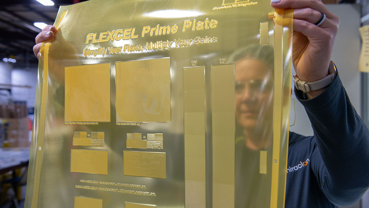 A man holds up a Flexcel Prime Plate