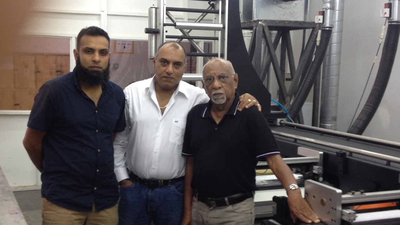 Pictured (from left): Muhammad Khamboo, Faizal Khamboo & Anwer Khamboo from Flexible Packaging Industries alongside their recently installed Edale FL-3 press