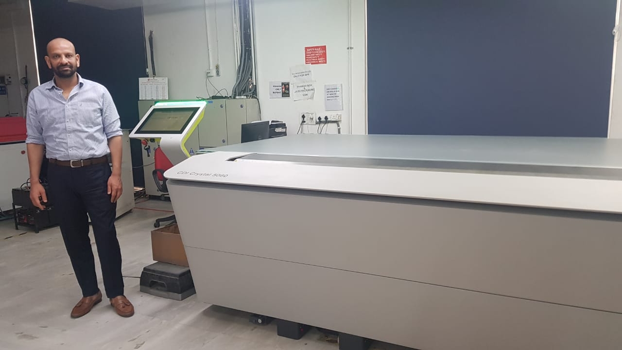 Deepanshu Goel, managing director, Creative Graphics in front of the new Esko CDI Crystal 5080 flexo plate imager installed at company's plant in Noida