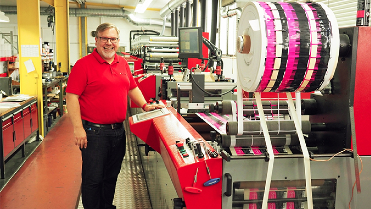 Dirk Handler, CEO of Etikettenfabrik Küchler, alongside one of his three Codimag Viva Aniflo 420 narrow web presses.
