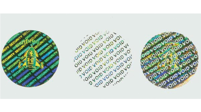 Figure 7.14 - shows the effects of removal of a tamper evident holographic foil label