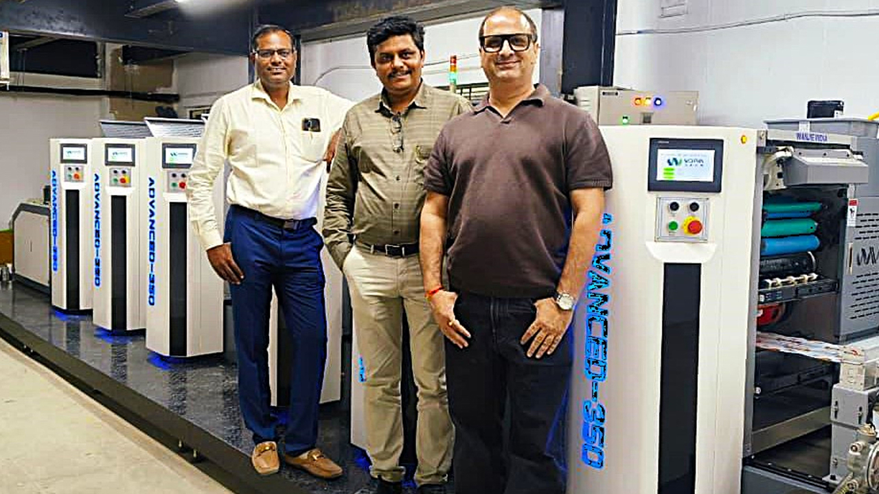 Umesh Dongre, Pramod Dongre and Rakesh Patel with the WJPS Advanced-350 press