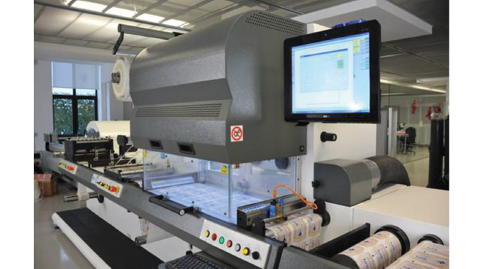 Figure 2.18 - Illustration shows a SEI spa Label Master modular digital finishing unit with laser die-cutting.jpg