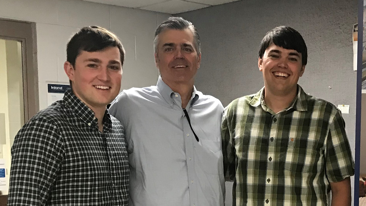 Mark Glendenning with his sons, Brad and Trent