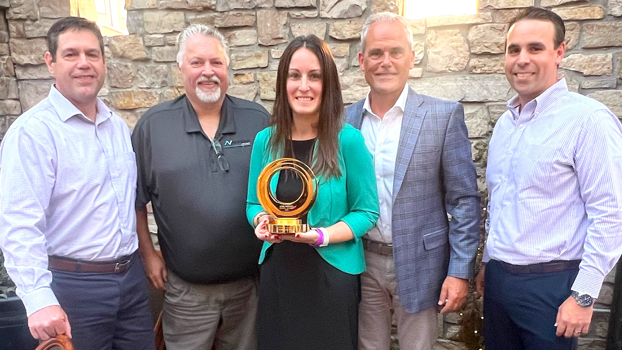 Paul Roux, Nick Noyes, Jessica McCarthy holding the Converter of the Year award, Tom Sargent, and Dan Rosenbaum