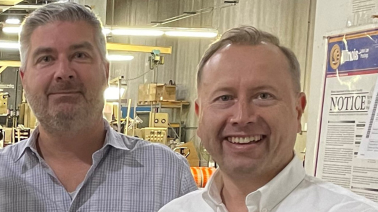 Kevin Kollman, owner of Prime Packaging, and Mariusz Sosnowski, CEO and president of HiFlow Solutions