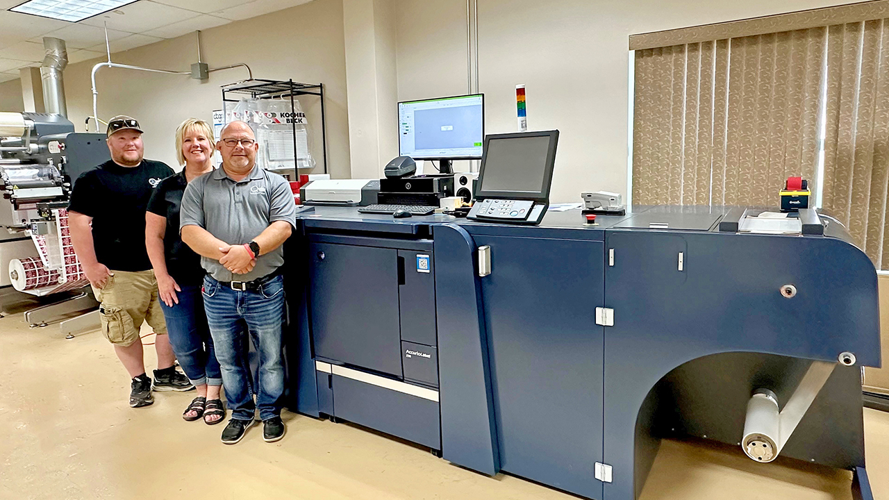 Tony Opitz, Annie Opitz and Mark Opitz with the AccurioLabel 230 press