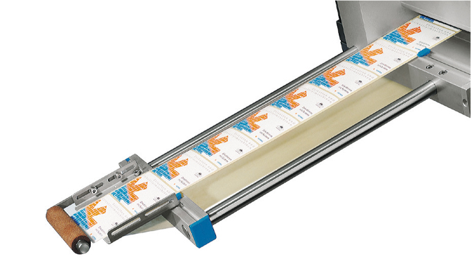 Figure 4.19 Use of a roller to press the label to the product or pack. Source- Herma