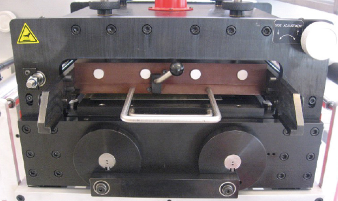 Figure 4.5 - Flatbed embossing unit