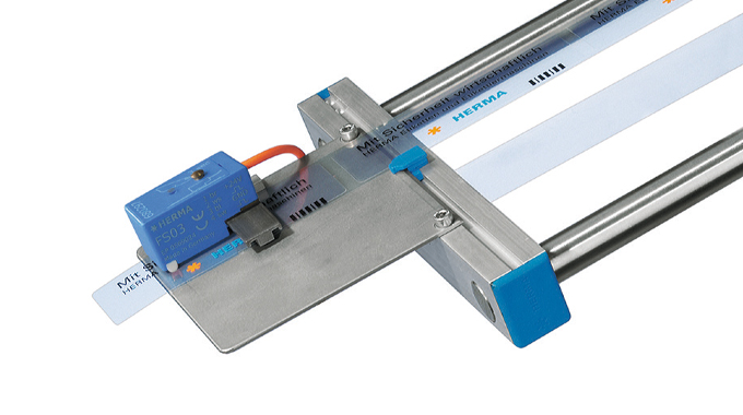 Figure 4.5 - Illustration of a label applicator label sensing device courtesy of Herma Figure 4.5 - Illustration of a label applicator label sensing device courtesy of Herma