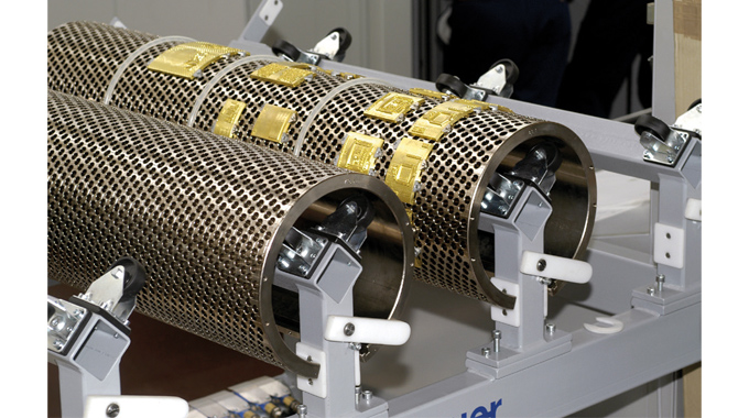Figure 6.11 - Segmented brass foiling dies mounted on a rotary honeycomb base Figure 6.11 - Segmented brass foiling dies mounted on a rotary honeycomb base