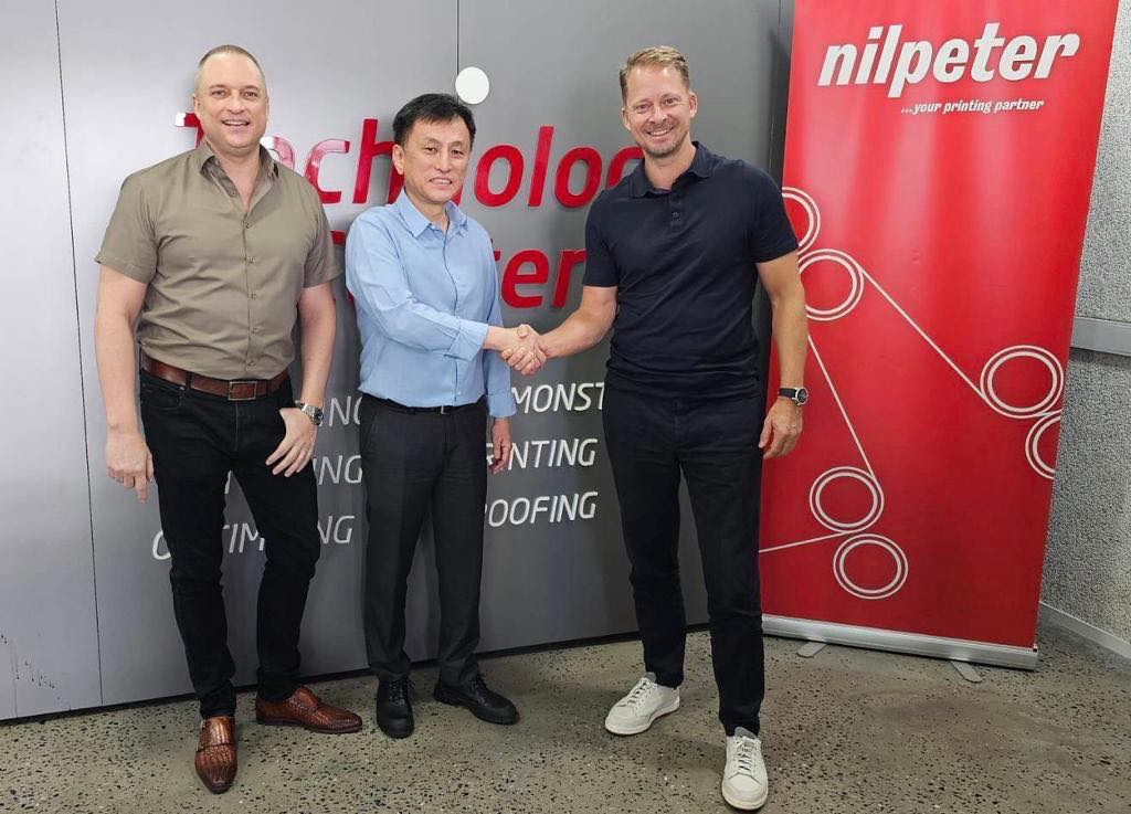 L-R: Erik Blankenstein, sales director of Nilpeter Asia Pacific; Michael Tsoi, CEO of Shrinkflex; and Peter Eriksen, COO of Nilpeter