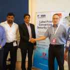 T P JAin shaking hands with Antony Cotton of Focus Label Machinery at LMAI Conference 2015
