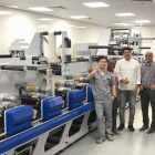 Solanki (third from left) and the team with the newly installed Weigang press at Sicon Pack plant in Nigeria