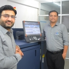 (Left) Dheeraj Sharma, owner of MD Graphics with his new Konica Minolta AccurioLabel 230