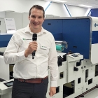 Tom Couckuyt, Customer Experience Centre manager next to the N730i digital color press