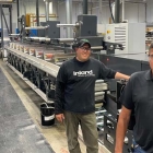 Inland Packaging press operator, Ronnie Goll, and 1st shift press supervisor, Brian Watson, with the recently installed Nilpeter FA-17