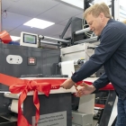 UK secretary of State for Transport, the Rt Hon Grant Shapps MP, cuts the ribbon on Silver Fox’s new Nilpeter FB-350, at an event on the June 24, 2022.