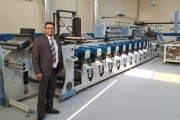 Saqar Ali, owner of Paramount Label Printing Press, with the Lombardi Flexoline 430 