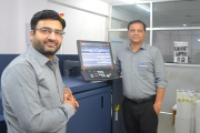 (Left) Dheeraj Sharma, owner of MD Graphics with his new Konica Minolta AccurioLabel 230