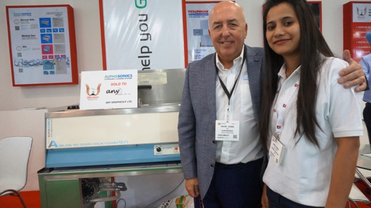 David Jones, managing director at Alphasonics with Swati from Weldon Celloplast after announcing the sale of Alphasonics Melanie Duo cleaning system to Anygraphics on the first day of Labelexpo India David Jones, managing director at Alphasonics with Swati from Weldon Celloplast after announcing the sale of Alphasonics Melanie Duo cleaning system to Anygraphics on the first day of Labelexpo India