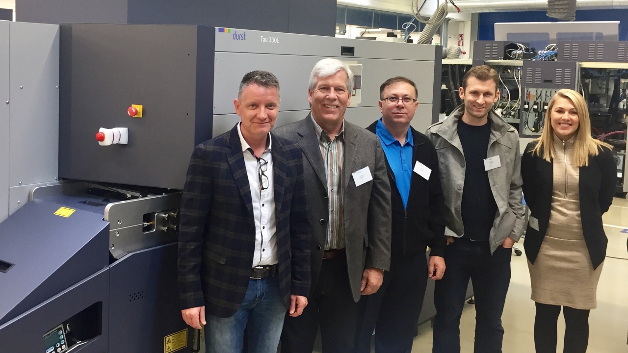 Pictured (from left): Norbert Hofer, Durst Phototechnik; Doru Brezoi, Craig Moreland and Drew Moreland, Coast Label; and Emily Kroll,  Durst Image Technology US