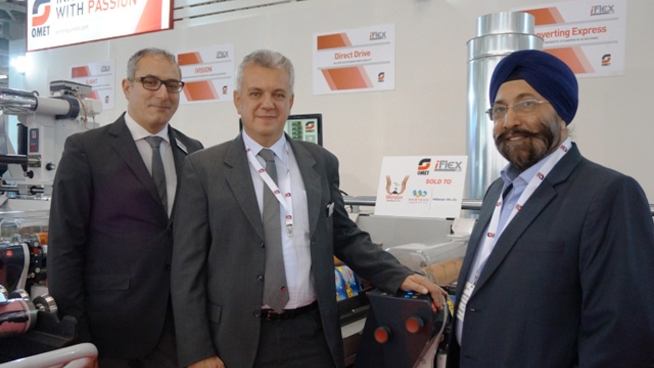 Pictured (from left): Paolo Grasso, export sales manager, and Marco Calcagni, sales director, at Omet with Harveer Sahni, managing director at Weldon Celloplast
