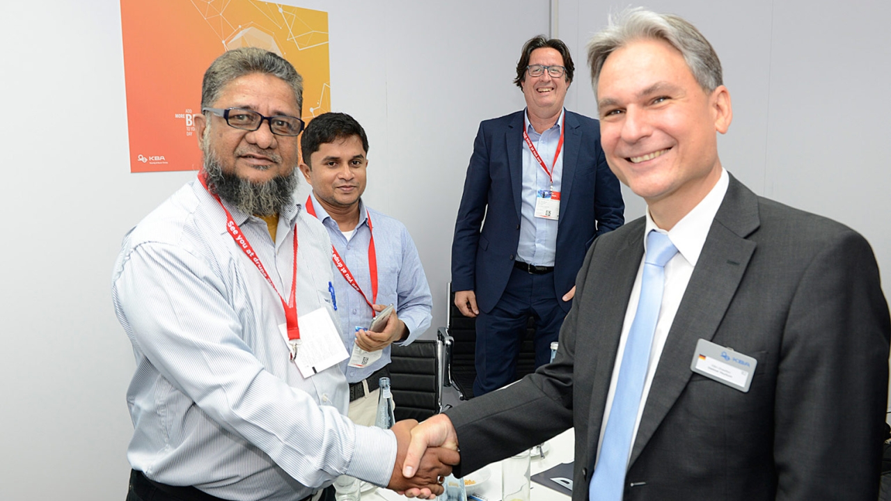 Ashan Habib Mamun (left), general manager of NRG Printing & Packaging, and Dietmar Heyduck (right), sales director at KBAAshan Habib Mamun (left), general manager of NRG Printing & Packaging, and Dietmar Heyduck (right), sales director at KBA-Sheetfed, seal the deal with a handshake-Sheetfed