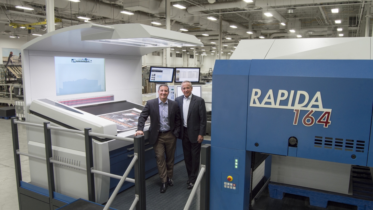 John Hans (left), CEO of Imagine!, and Robert Lothenbach (right), founder of Imagine!, with the new press John Hans (left), CEO of Imagine!, and Robert Lothenbach (right), founder of Imagine!, with the new press