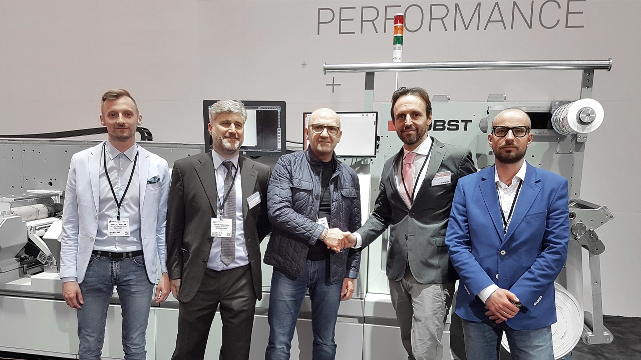 From left to right: Messrs Maciej Wolak, Key Account Manager, Tom-Druk; Leszek Trzaskowski, Managing Director, Rotary Sp. z o.o; Tomasz Wolak, CEO, Tom-Druk; Matteo Cardinotti, Head of Narrow & mid-web multi-process Product Line and Managing Director, Bobst Firenze; Patryk Chorazyczewski, Key Account Manager, Tom Druk From left to right: Messrs Maciej Wolak, Key Account Manager, Tom-Druk; Leszek Trzaskowski, Managing Director, Rotary Sp. z o.o; Tomasz Wolak, CEO, Tom-Druk; Matteo Cardinotti, Head of Narrow & mid-web multi-process Product Line and Managing Director, Bobst Firenze; Patryk Chorazyczewski, Key Account Manager, Tom Druk