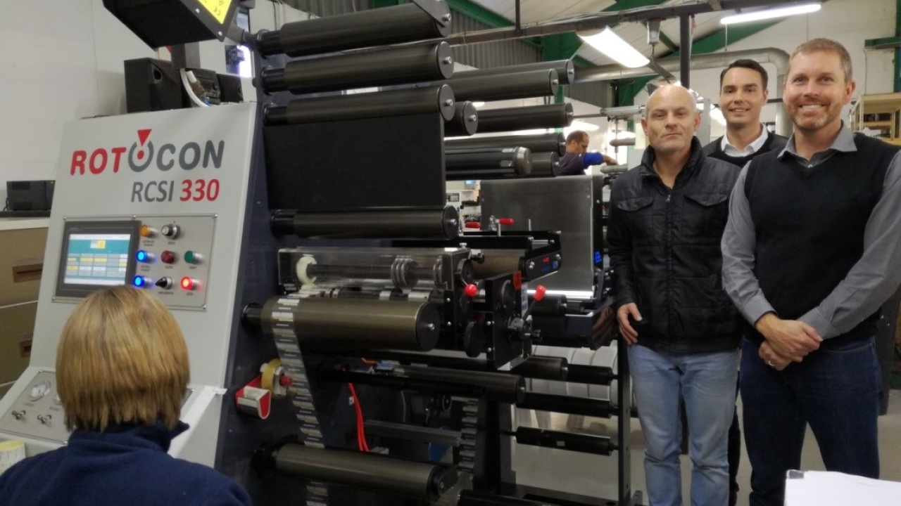 Jason Wilson (left), Future Labels production manager, and Elton Neethling (right), managing director at Future Labels, with Rotocon's Pascal Aengenvoort (center)