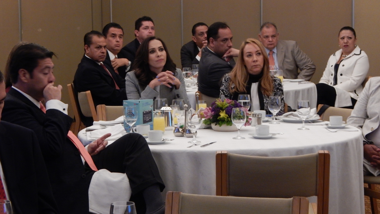Pictured center-left: Ametiq president Keren Becerra