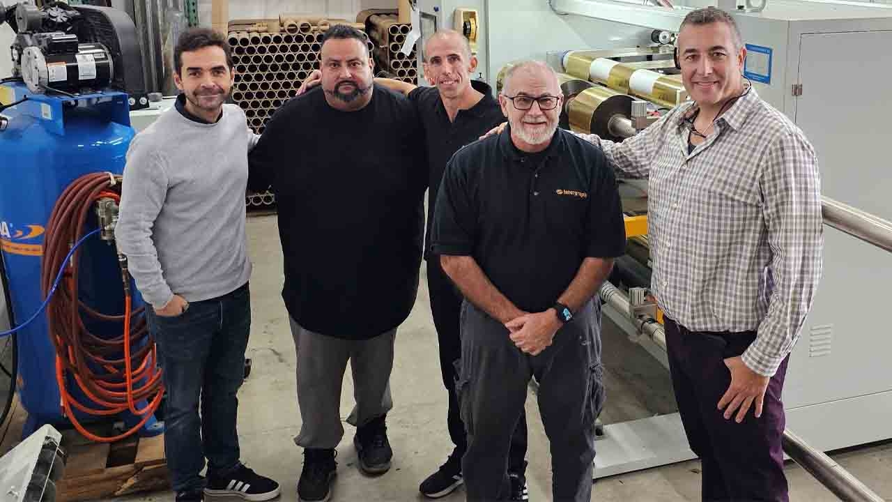 Martin Fraire (right), CEO of Leftech, and his team in the new foil slitting center in Florida, USA