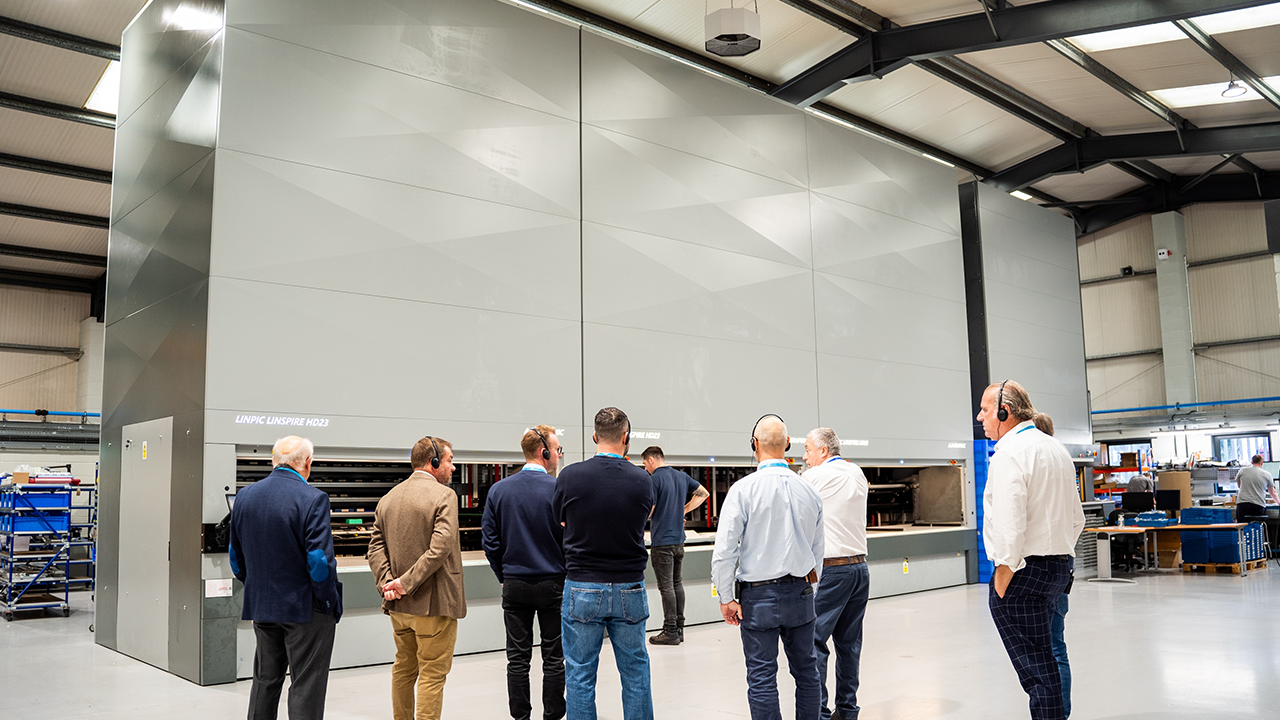 Open house attendees tour the facility