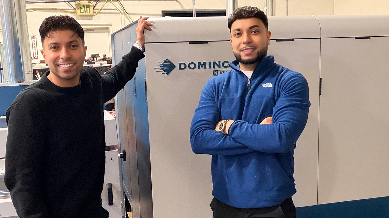 Luis and Mario Paez with the Domino press