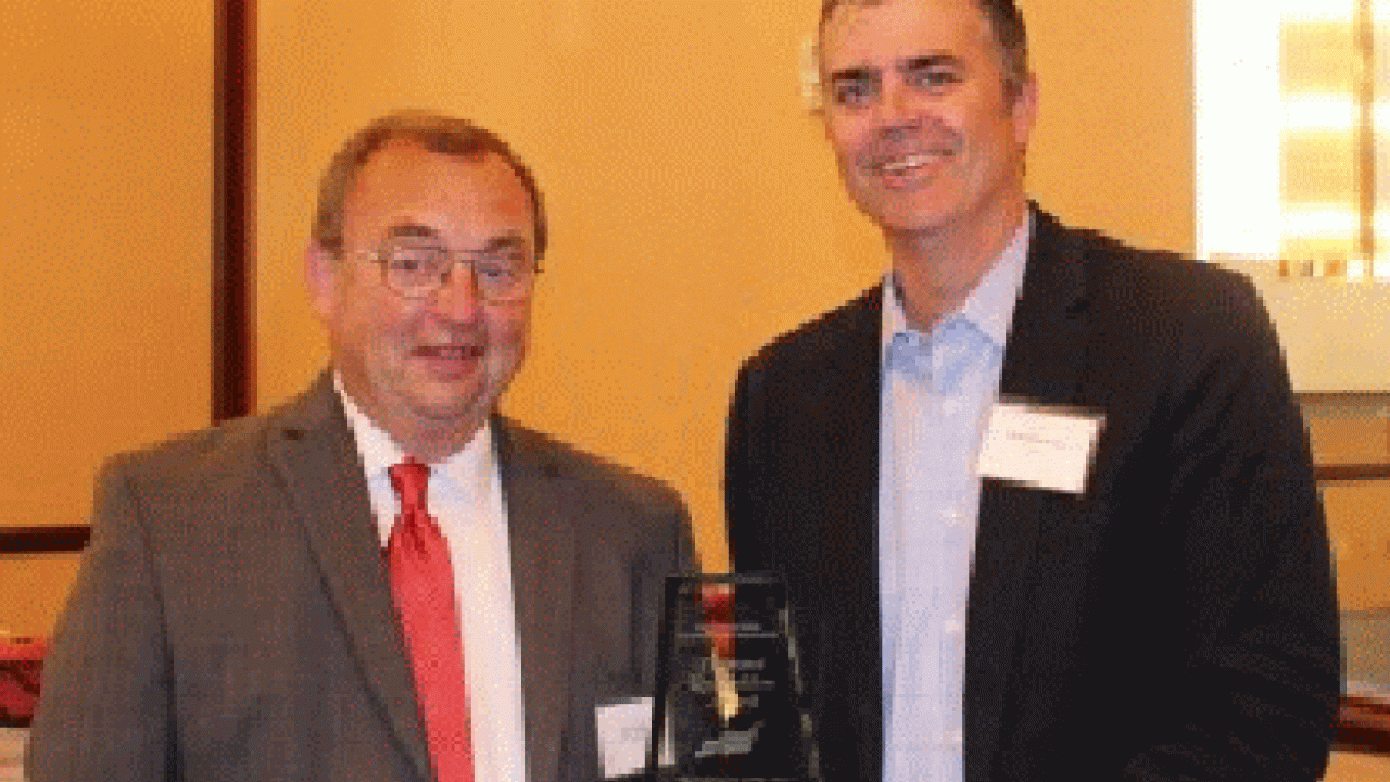 Mark Glendenning, CEO and Owner, accepts award from Jerry Arndt, board Vice President of LADCO Mark Glendenning, CEO and Owner, accepts award from Jerry Arndt, board Vice President of LADCO