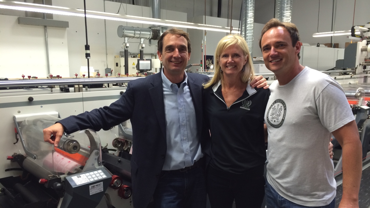 Tom Kathy and Andy Staib in front of their latest investment the Omet XFlex X6 multi substrate press
