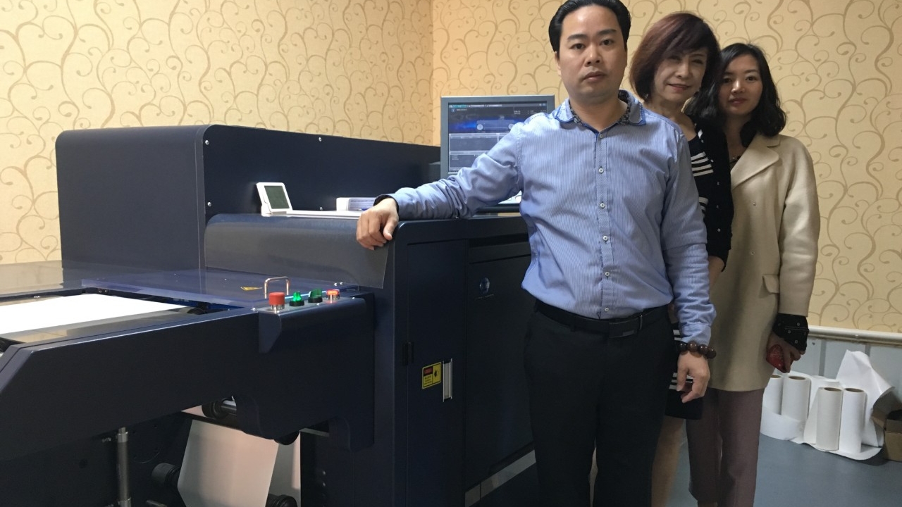 Konica Minolta AccurioLabel 190 installed at Gurong Printing. From left: Lawrence Zhang; Jean Li, managing vice president of the label printing branch of PEIAC; Jia Yan, vice secretary of the label printing branch of PEIAC
