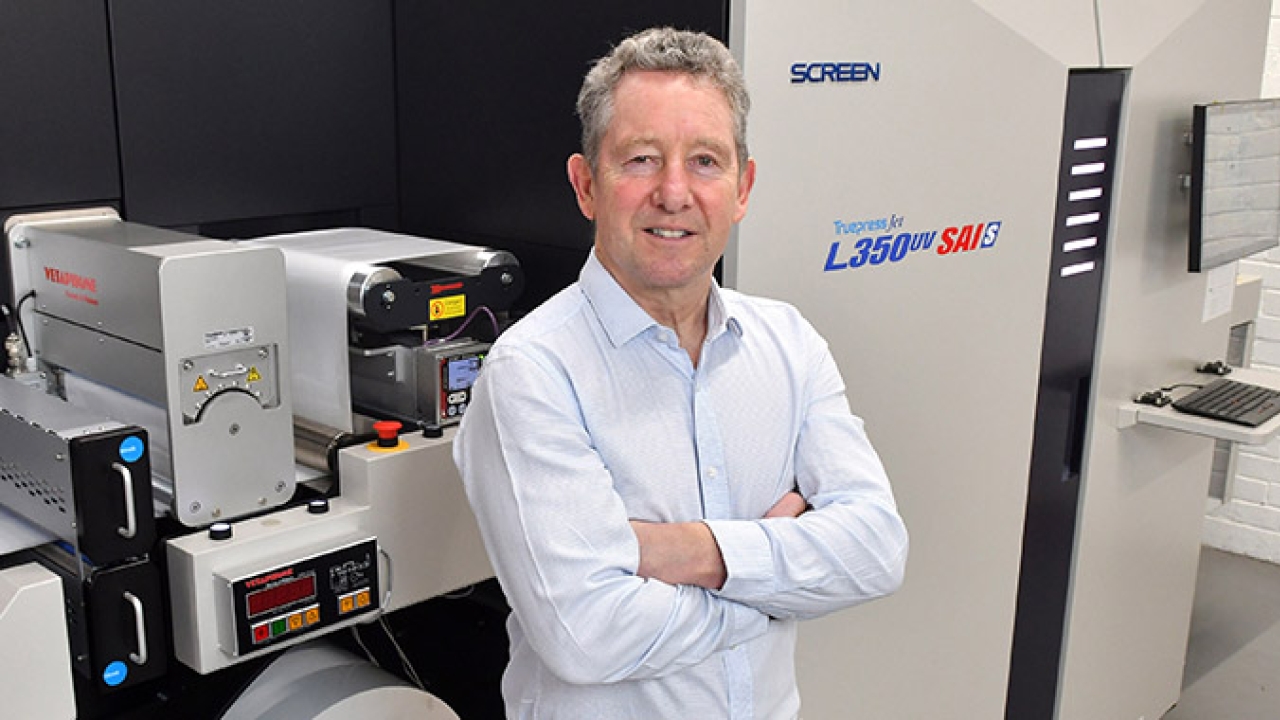 Rod Fisher, managing director of Print-Leeds, in front of the newly installed Screen press