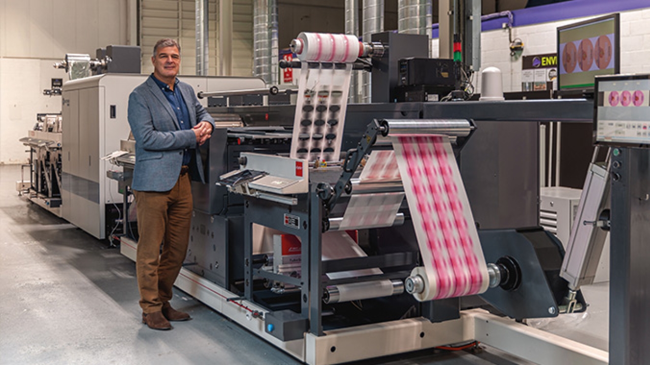 Olympus Print Group invested in pioneering installation of GEW's LeoLED UV system and a 12-color Nilpeter-Domino hybrid press with in-line foiling