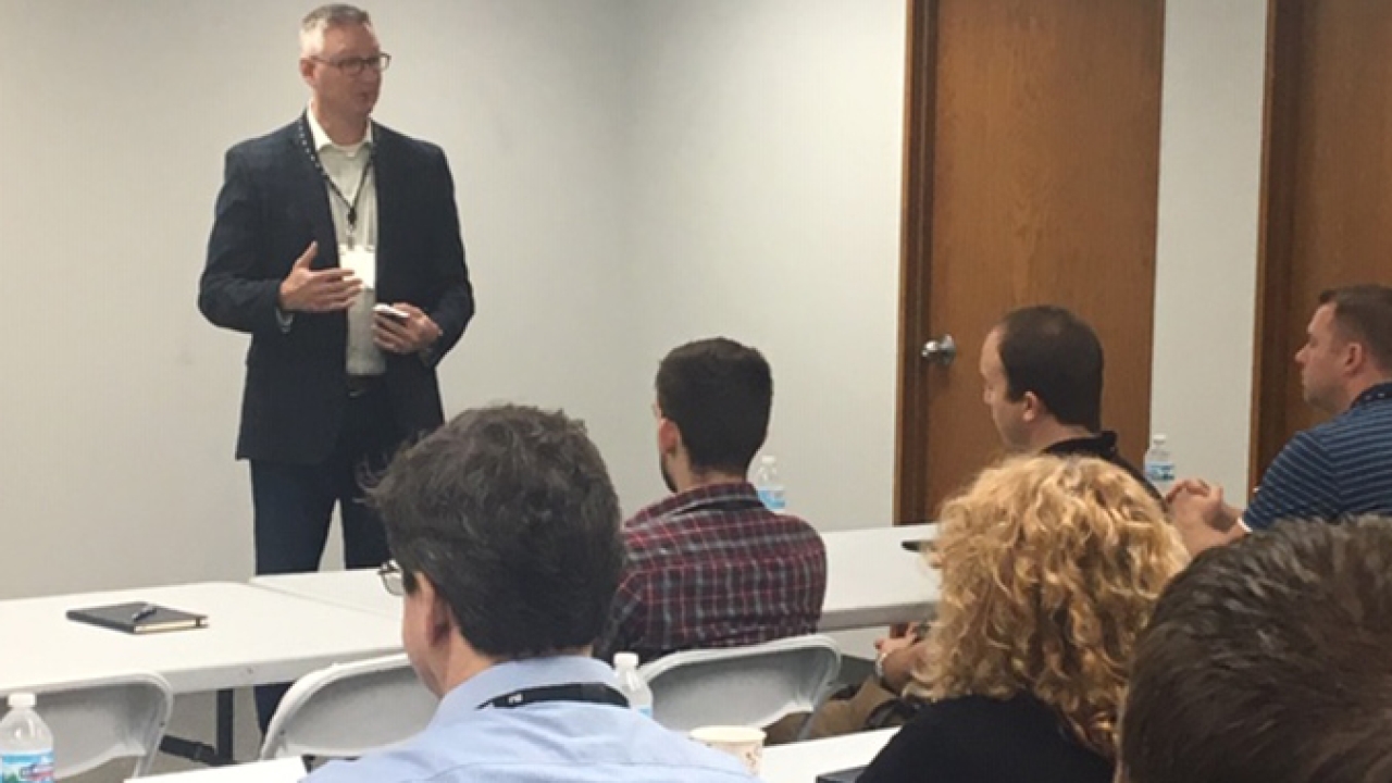 Bruce Hanson, labels and forms division president, addresses the  crowd during an engineering day hosted at RRD’s Milwaukee facility