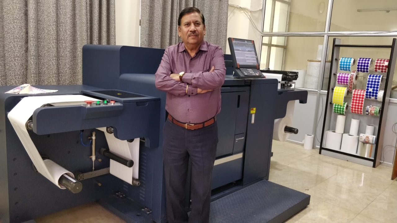 Sandeep Juneja, owner of Pinnacle Traxim, with the new Konica Minolta AccurioLabel 230 digital press