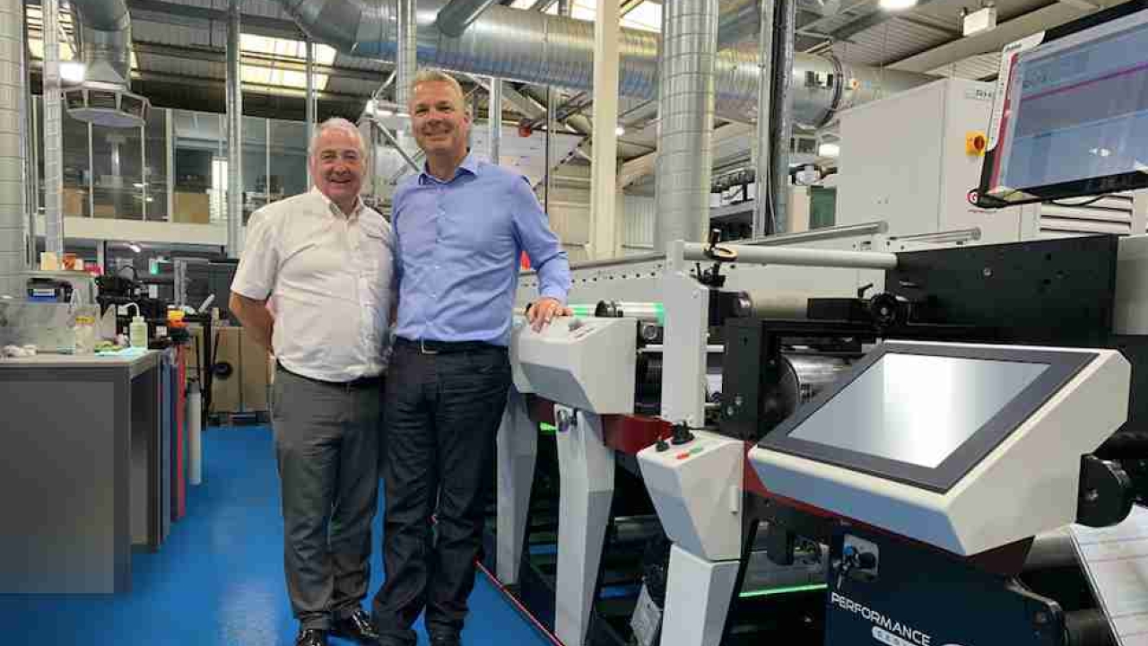 Mark Andy’s UK and Ireland sales manager Paul MacDonald with Berkshire Labels’ managing director Paul Roscoe and the first P9E to be installed in Europe