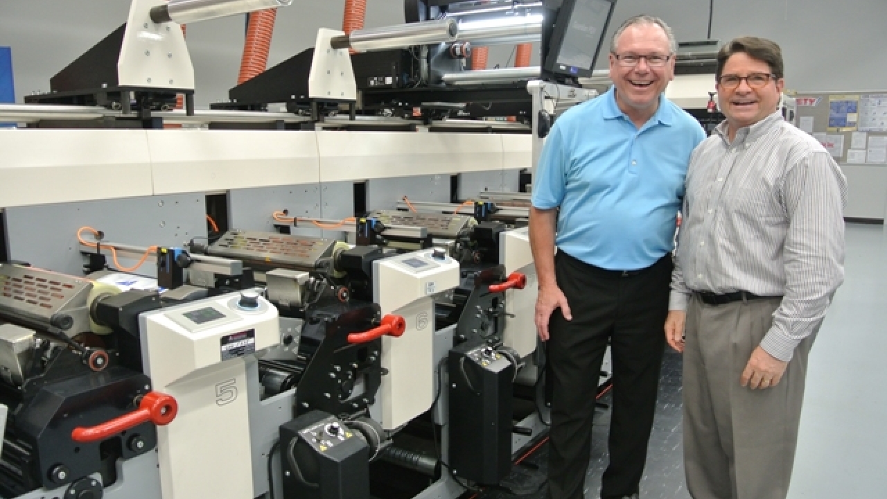 Brad Elledge and Denny McGee, president of MPS America