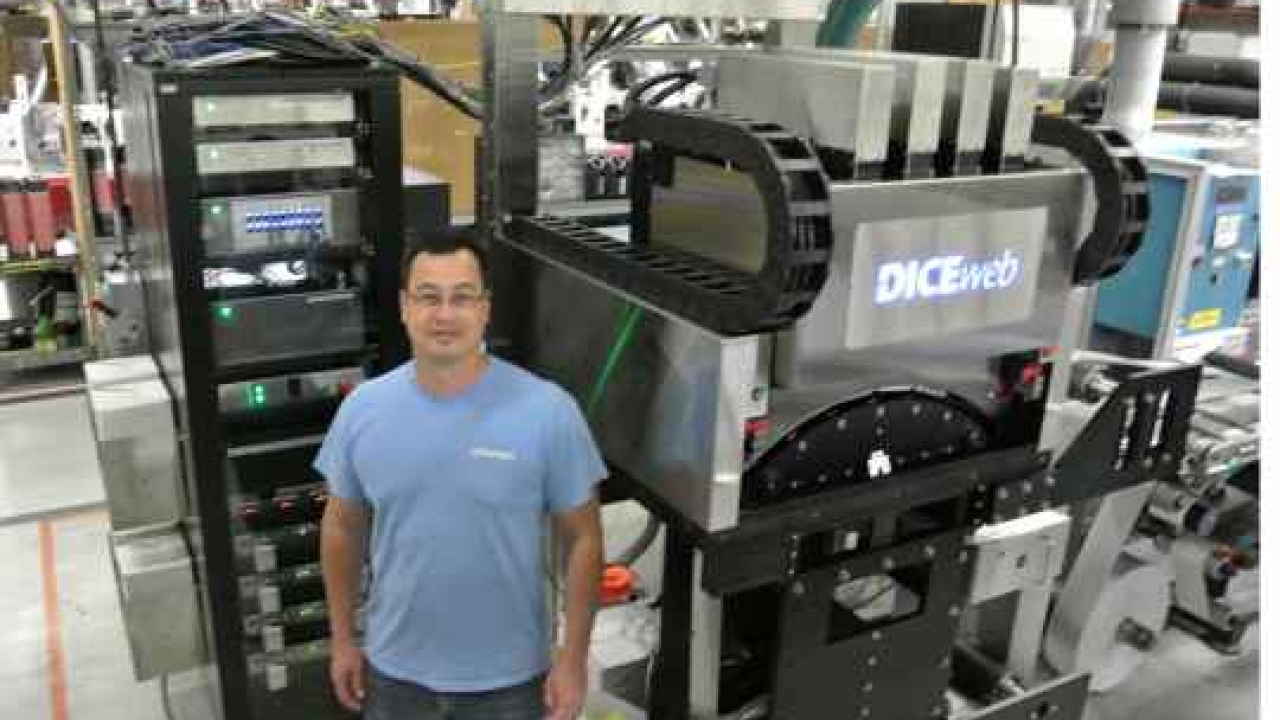 Topflight Corporation plant manager Brian Litvak with the DICEweb unit installed on an existing flexo press Topflight Corporation plant manager Brian Litvak with the DICEweb unit installed on an existing flexo press