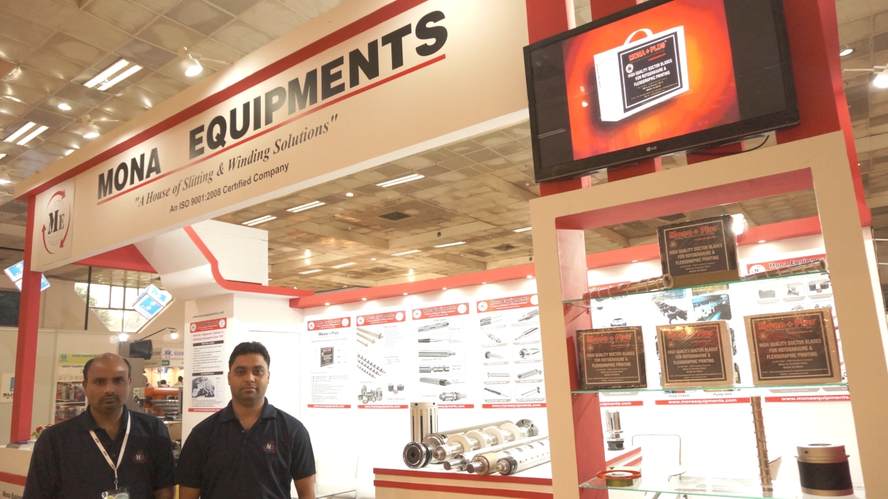 Pawan Kumar Singh, managing director at Mona Equipments with his colleague at the company's stand at Pack Plus India 2014