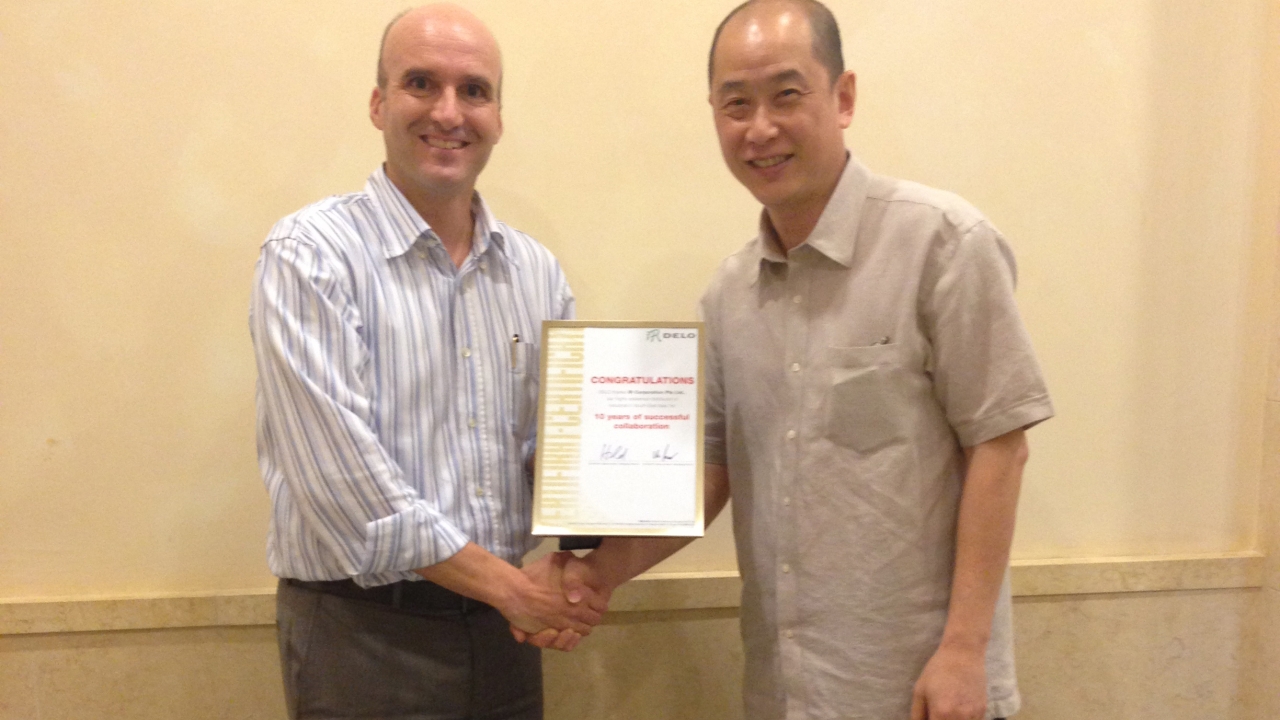 The certificate was presented to CH Lee of IR Corporation (pictured, right) The certificate was presented to CH Lee of IR Corporation (pictured, right)