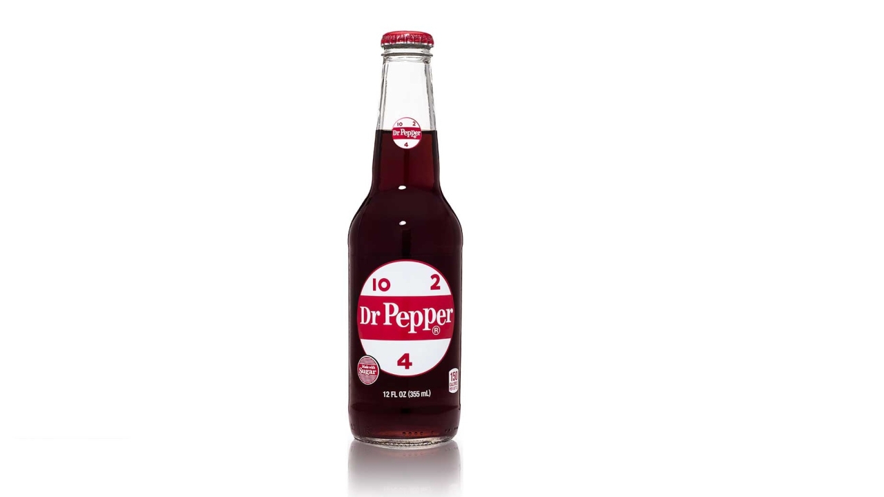Glass bottle features PS label with nostalgic 10-2-4 motif Glass bottle features PS label with nostalgic 10-2-4 motif